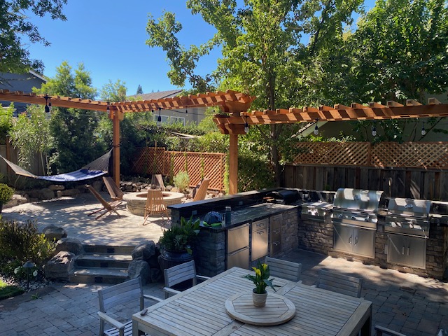 Outdoor room in Alamo featuring a barbecue & fire pit